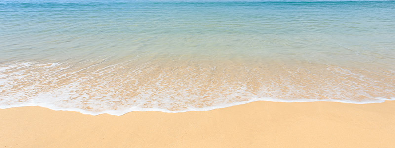 Photo d'une vague sur le sable, sophro and co, sophrologie et cohérence cardiaque à Angers. 